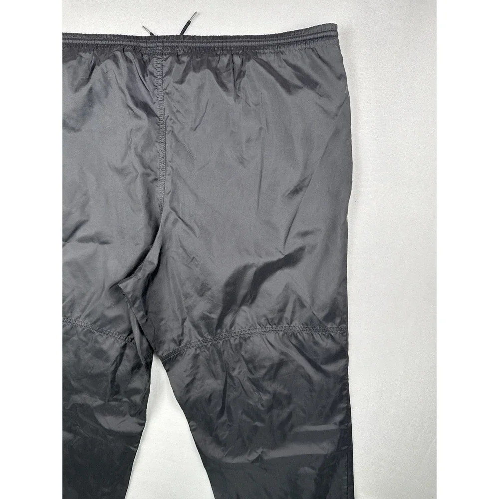 Vintage 90s Nike Black Nylon Track Pants Swoosh Zip Leg Windbreaker L